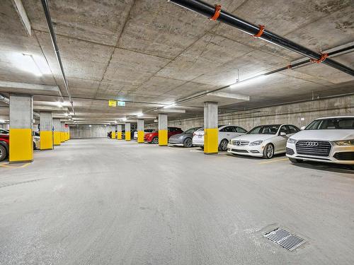 Stationnement - 1004-2855 Av. Du Cosmodôme, Laval (Chomedey), QC - Indoor Photo Showing Garage