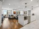 Vue d'ensemble - 1004-2855 Av. Du Cosmodôme, Laval (Chomedey), QC  - Indoor Photo Showing Kitchen With Upgraded Kitchen 