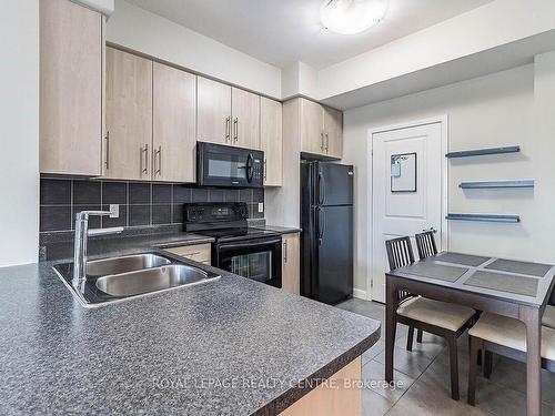 1210-225 Sherway Gardens Rd, Toronto, ON - Indoor Photo Showing Kitchen With Double Sink