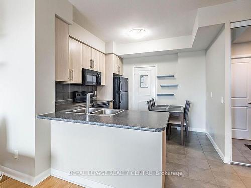 1210-225 Sherway Gardens Rd, Toronto, ON - Indoor Photo Showing Kitchen With Double Sink