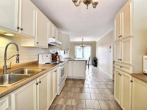 Cuisine - 94 Rue Cardinal-Bégin E., Rouyn-Noranda, QC - Indoor Photo Showing Kitchen With Double Sink