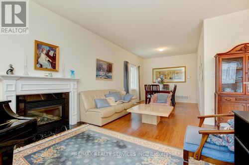 33 - 28 Calliandra Trail, Brampton, ON - Indoor Photo Showing Living Room With Fireplace