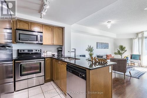 907 - 9 George Street N, Brampton, ON - Indoor Photo Showing Kitchen With Stainless Steel Kitchen With Double Sink