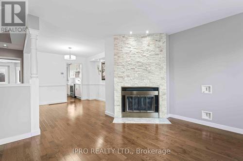 Unit#3 - 4605 Donegal Drive, Mississauga, ON - Indoor Photo Showing Living Room With Fireplace