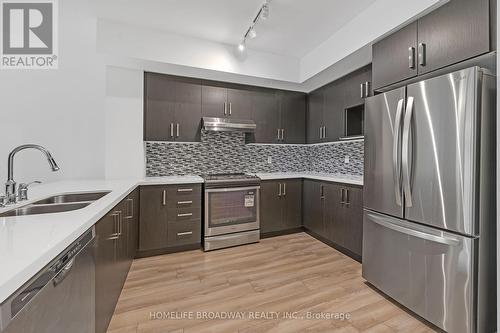 103 - 89 South Town Centre Boulevard, Markham, ON - Indoor Photo Showing Kitchen With Stainless Steel Kitchen With Double Sink With Upgraded Kitchen