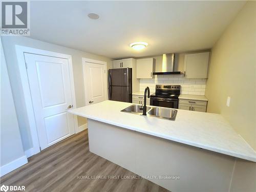 320 Mississaga Street W, Orillia, ON - Indoor Photo Showing Kitchen With Double Sink