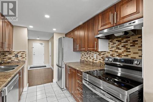 1610 - 1 Rowntree Road, Toronto, ON - Indoor Photo Showing Kitchen With Double Sink