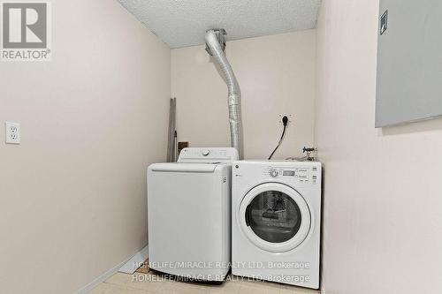 1610 - 1 Rowntree Road, Toronto, ON - Indoor Photo Showing Laundry Room