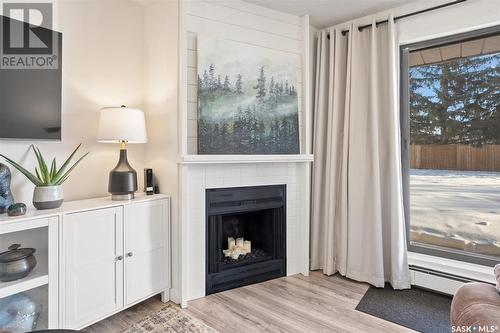 B3 385 Kingsmere Boulevard, Saskatoon, SK - Indoor Photo Showing Living Room With Fireplace