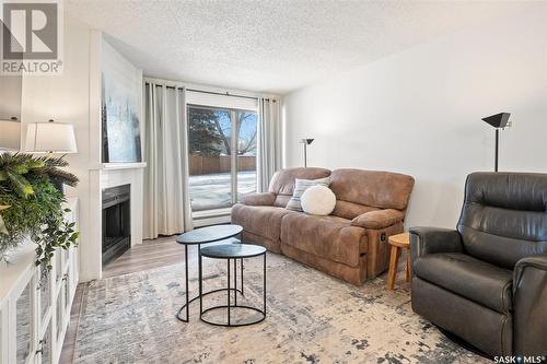 B3 385 Kingsmere Boulevard, Saskatoon, SK - Indoor Photo Showing Living Room With Fireplace