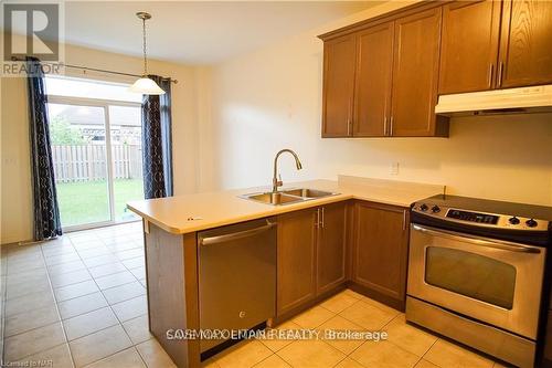 4360 Chemonda Street, Niagara Falls, ON - Indoor Photo Showing Kitchen With Double Sink