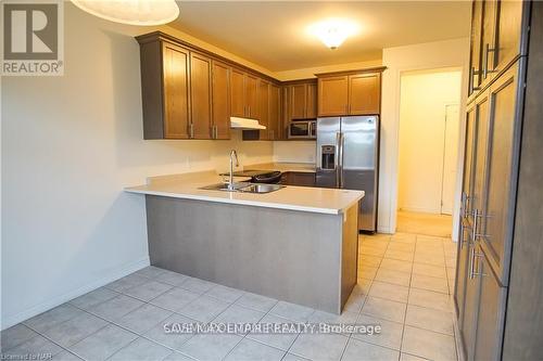 4360 Chemonda Street, Niagara Falls, ON - Indoor Photo Showing Kitchen With Double Sink