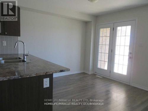 142 Golden Springs Drive, Brampton, ON - Indoor Photo Showing Kitchen With Double Sink