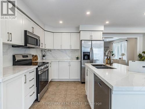 4885 Capri Crescent, Burlington, ON - Indoor Photo Showing Kitchen With Double Sink With Upgraded Kitchen