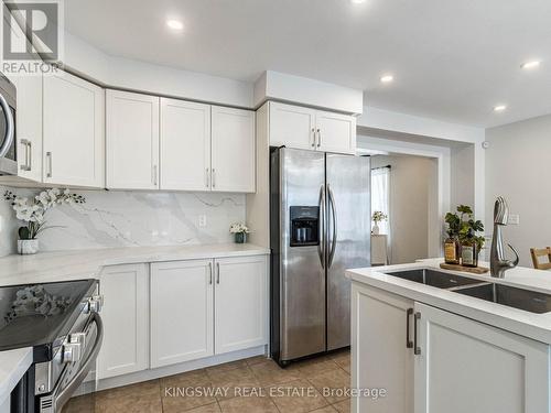 4885 Capri Crescent, Burlington, ON - Indoor Photo Showing Kitchen With Double Sink