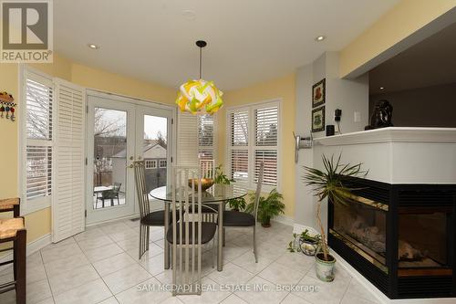 7350 Black Walnut Trail, Mississauga, ON - Indoor Photo Showing Dining Room With Fireplace