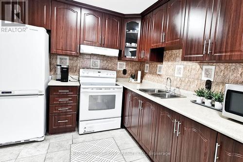 185 - 6448 Finch Avenue W, Toronto, ON - Indoor Photo Showing Kitchen With Double Sink