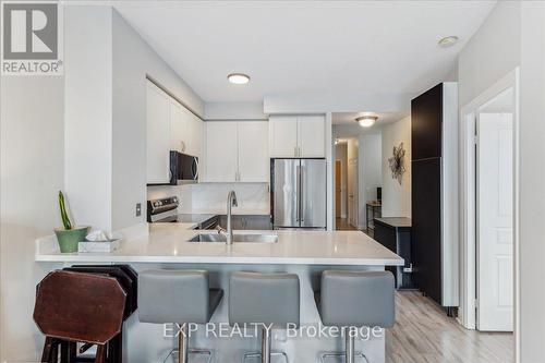 312 - 3939 Duke Of York Boulevard, Mississauga, ON - Indoor Photo Showing Kitchen With Stainless Steel Kitchen With Double Sink With Upgraded Kitchen