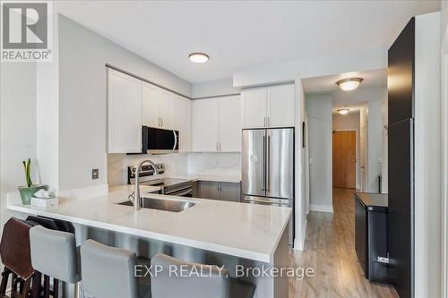 312 - 3939 Duke Of York Boulevard, Mississauga, ON - Indoor Photo Showing Kitchen With Stainless Steel Kitchen With Upgraded Kitchen