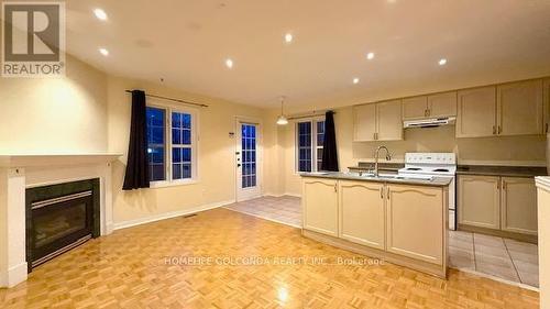 82 Ellesmere Street E, Richmond Hill, ON - Indoor Photo Showing Kitchen With Fireplace