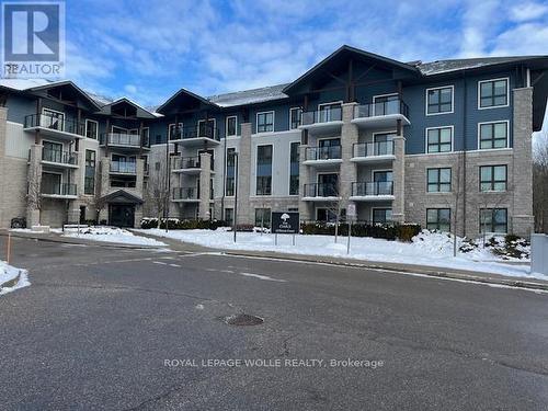 411 - 50 Bryan Court, Kitchener, ON - Outdoor With Balcony With Facade