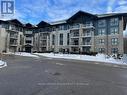 411 - 50 Bryan Court, Kitchener, ON  - Outdoor With Balcony With Facade 