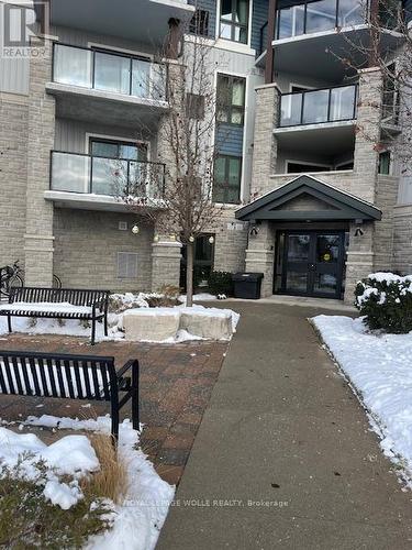 411 - 50 Bryan Court, Kitchener, ON - Outdoor With Balcony With Facade