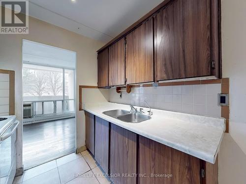 202 - 2 Glamorgan Avenue, Toronto, ON - Indoor Photo Showing Kitchen With Double Sink