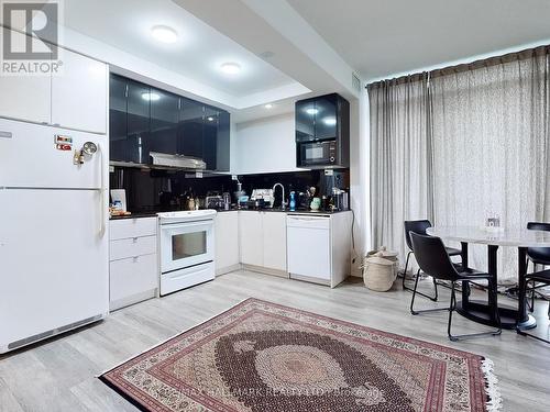 3209 - 121 Mcmahon Drive, Toronto, ON - Indoor Photo Showing Kitchen