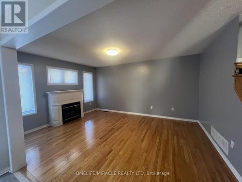 Upper - 32 Earlsbridge Boulevard, Brampton, ON - Indoor With Fireplace