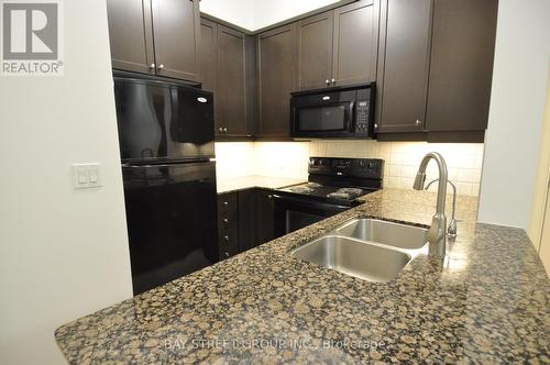 2001 - 90 Absolute Avenue, Mississauga, ON - Indoor Photo Showing Kitchen With Double Sink