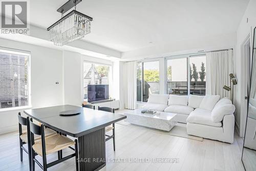 206 - 1888 Queen Street E, Toronto, ON - Indoor Photo Showing Living Room