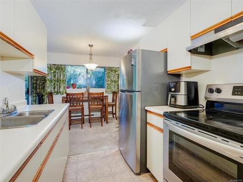 201-830 Esquimalt Rd, Esquimalt, BC - Indoor Photo Showing Kitchen With Double Sink