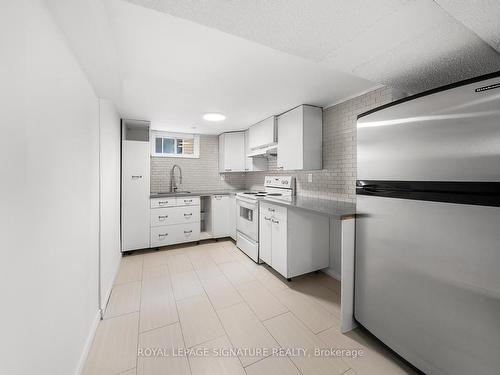 Bsmt-12 Chiswick Ave, Toronto, ON - Indoor Photo Showing Kitchen