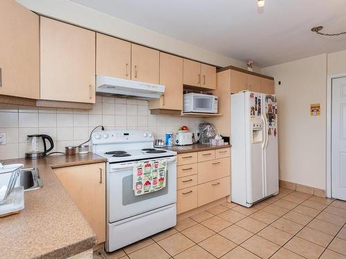 Kitchen - 4551  - 4555A Ch. Du Souvenir, Laval (Chomedey), QC - Indoor Photo Showing Kitchen With Double Sink