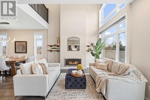 210 Taurus Place, Ottawa, ON - Indoor Photo Showing Living Room With Fireplace