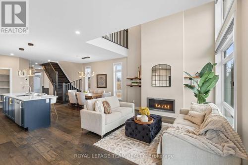 210 Taurus Place, Ottawa, ON - Indoor Photo Showing Living Room With Fireplace