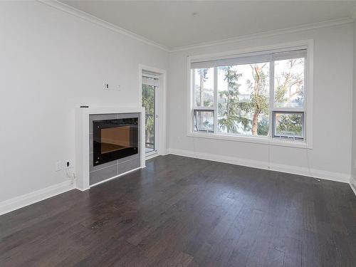 113-1145 Sikorsky Rd, Langford, BC - Indoor Photo Showing Other Room With Fireplace