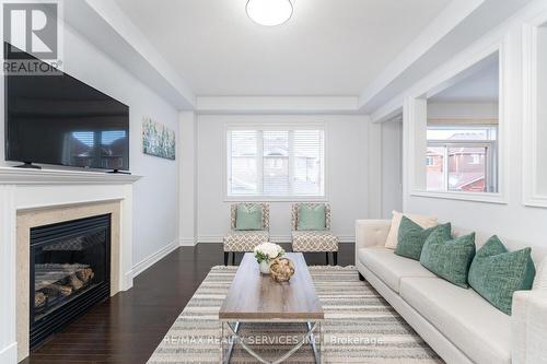 5452 Meadowcrest Avenue, Mississauga, ON - Indoor Photo Showing Living Room With Fireplace