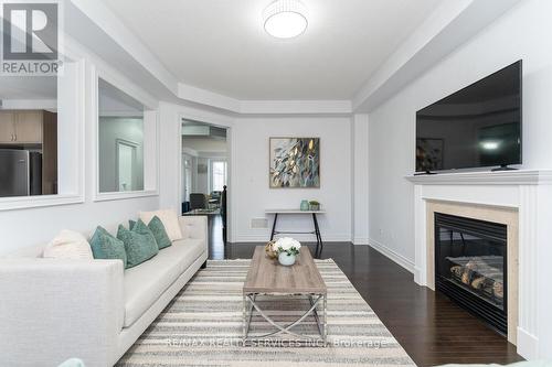 5452 Meadowcrest Avenue, Mississauga, ON - Indoor Photo Showing Living Room With Fireplace