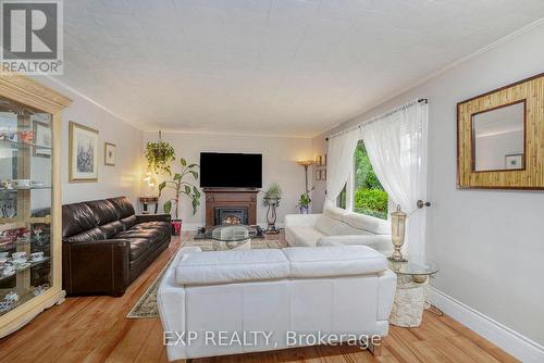 450 Queen Street E, Montague, ON - Indoor Photo Showing Living Room With Fireplace