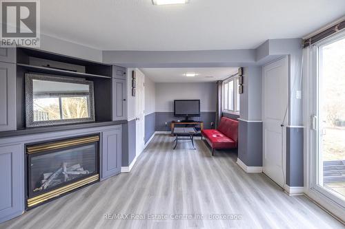 15 - 295 Water Street, Guelph (Old University), ON - Indoor Photo Showing Living Room With Fireplace