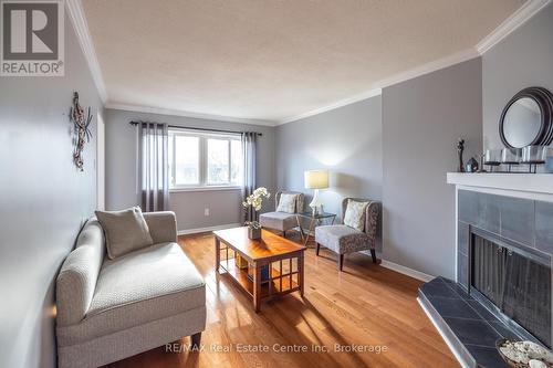 15 - 295 Water Street, Guelph (Old University), ON - Indoor Photo Showing Living Room With Fireplace