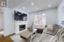 38 Eastport Drive, Toronto, ON  - Indoor Photo Showing Living Room With Fireplace 