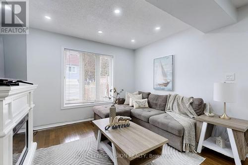 38 Eastport Drive, Toronto, ON - Indoor Photo Showing Living Room With Fireplace