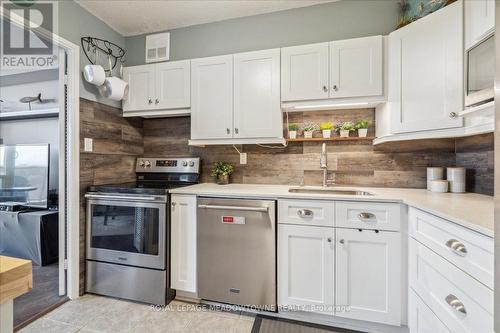 604 - 2665 Windwood Drive, Mississauga, ON - Indoor Photo Showing Kitchen