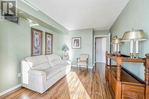 606 - 320 Mill Street S, Brampton, ON - Indoor Photo Showing Living Room