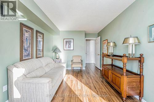 606 - 320 Mill Street S, Brampton, ON - Indoor Photo Showing Living Room