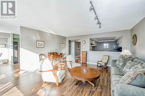 606 - 320 Mill Street S, Brampton, ON - Indoor Photo Showing Living Room