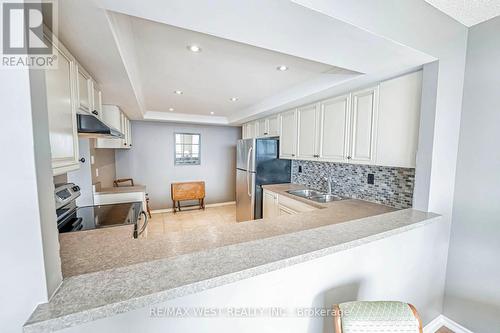 606 - 320 Mill Street S, Brampton, ON - Indoor Photo Showing Kitchen With Double Sink